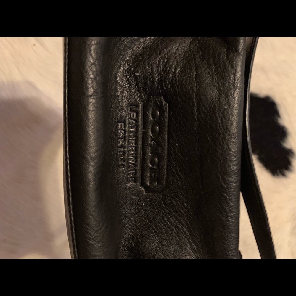Coach clutch with strap